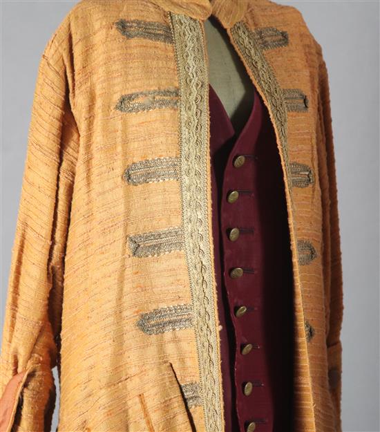 Nine theatrical frock coats and a waistcoat, in various colours and sizes